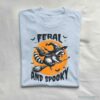 Feral and Spooky Raccoon Halloween T Shirt Light Blue S 1 1